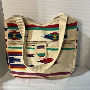 100% cotton Southwestern/Boho bag with inner and outer pockets.